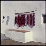 Guadix, Granada [Ristras de pimientos puestos a secar en la pare